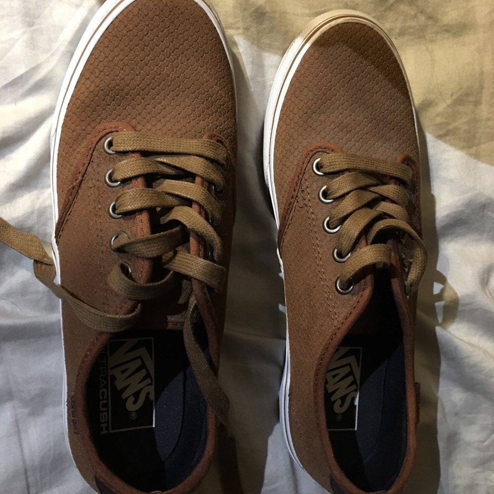 Vans lace up tennis shoes